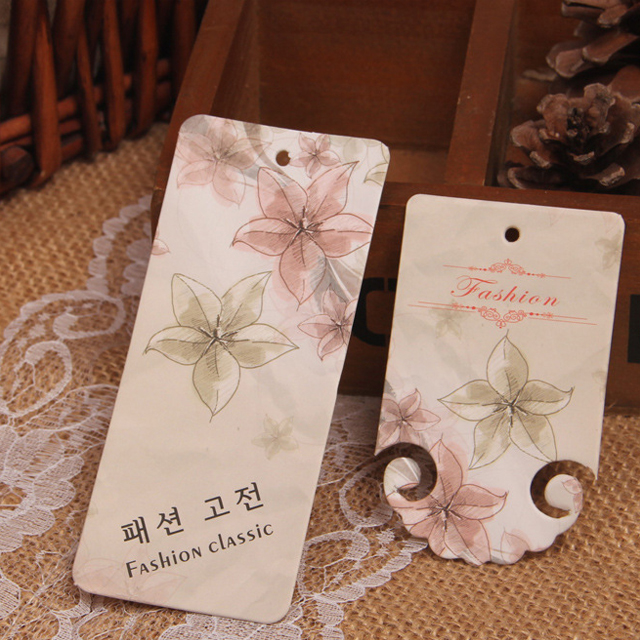 Dongguan factory wholesale swing tags customized lady clothing price hang tag